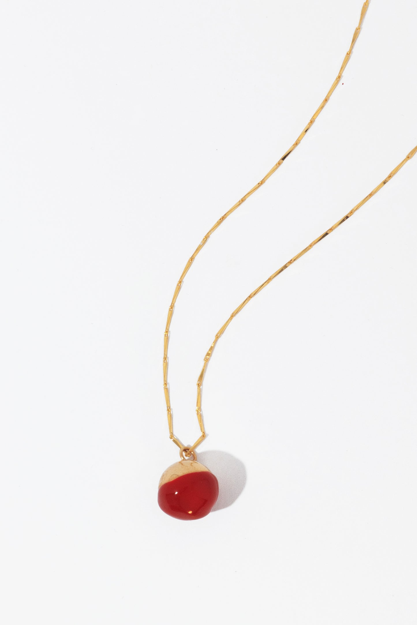 Marbles necklace with a hint of red