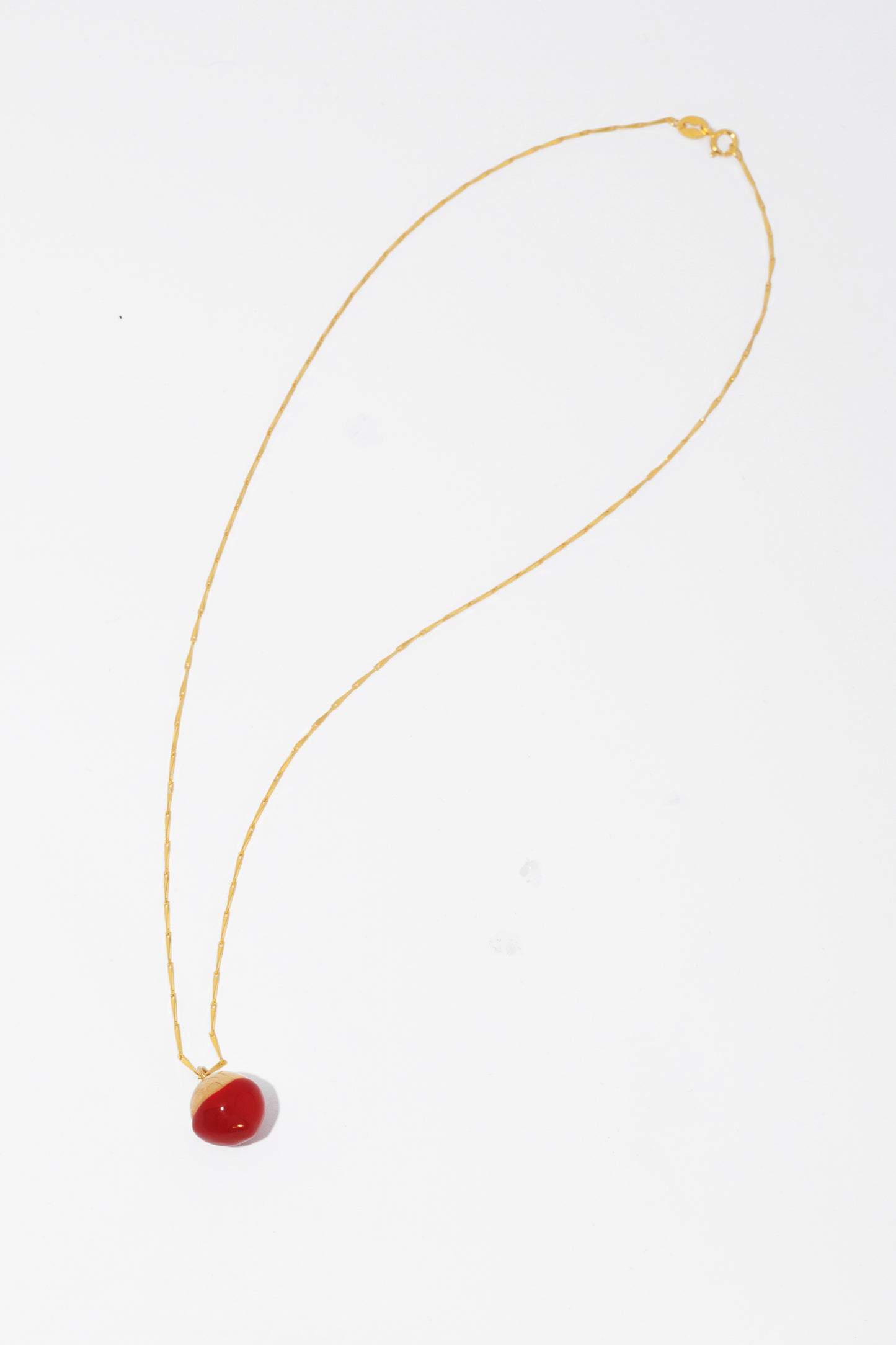 Marbles necklace with a hint of red