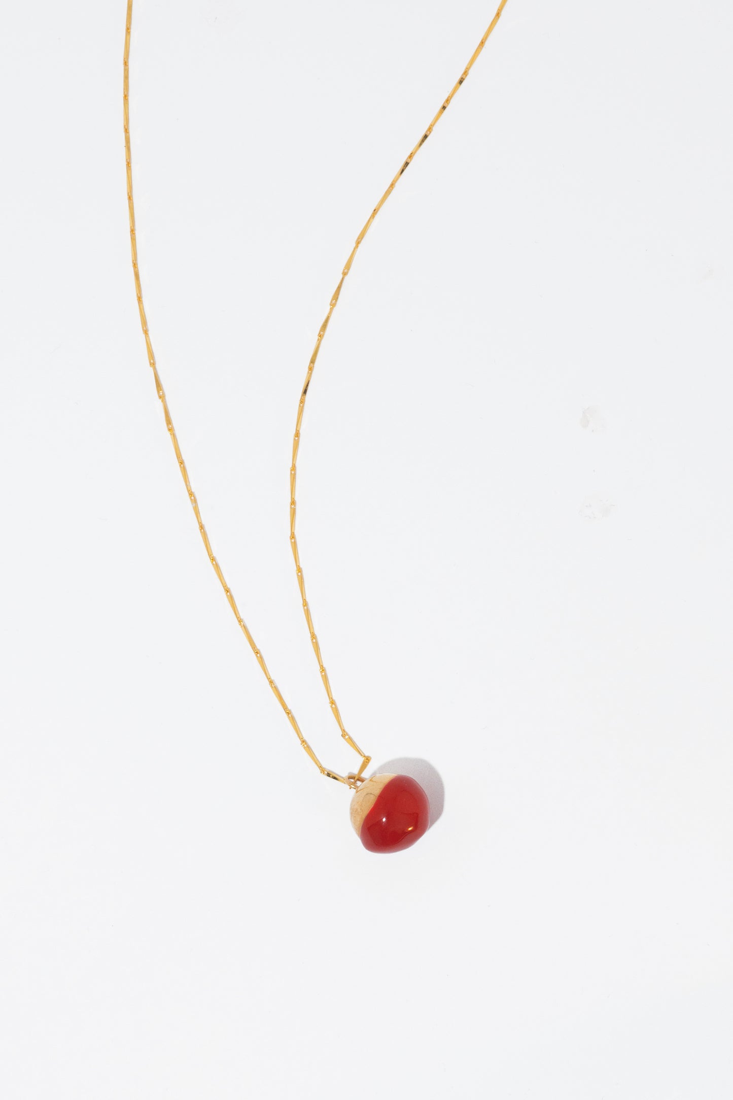 Marbles necklace with a hint of red