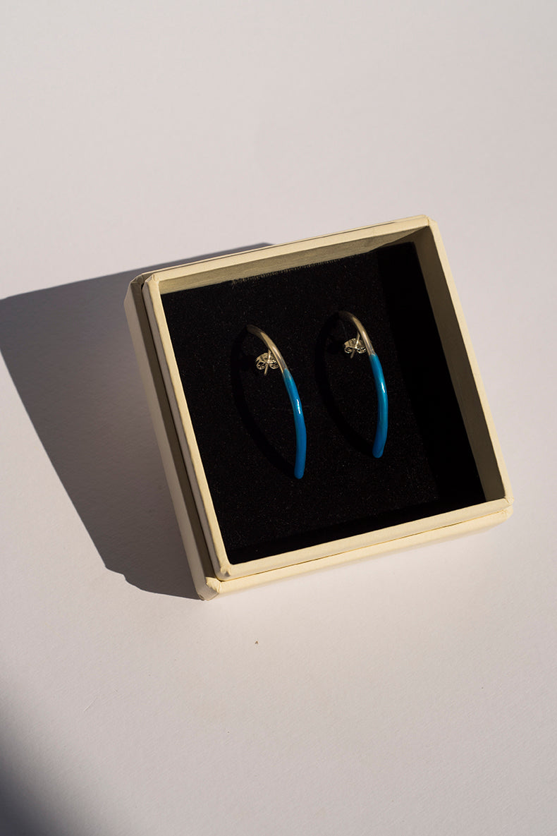 Bow earrings with a hint of blue