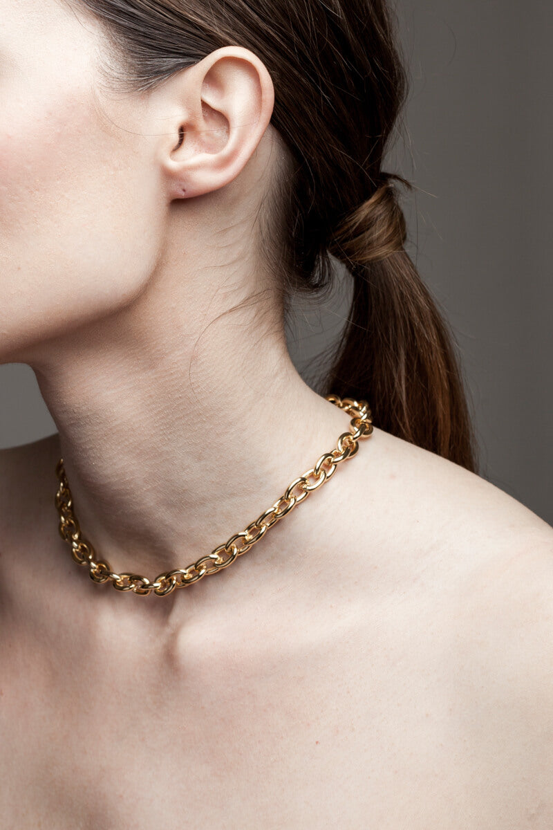 Anchor necklace is made of 24K gold-plated brass.