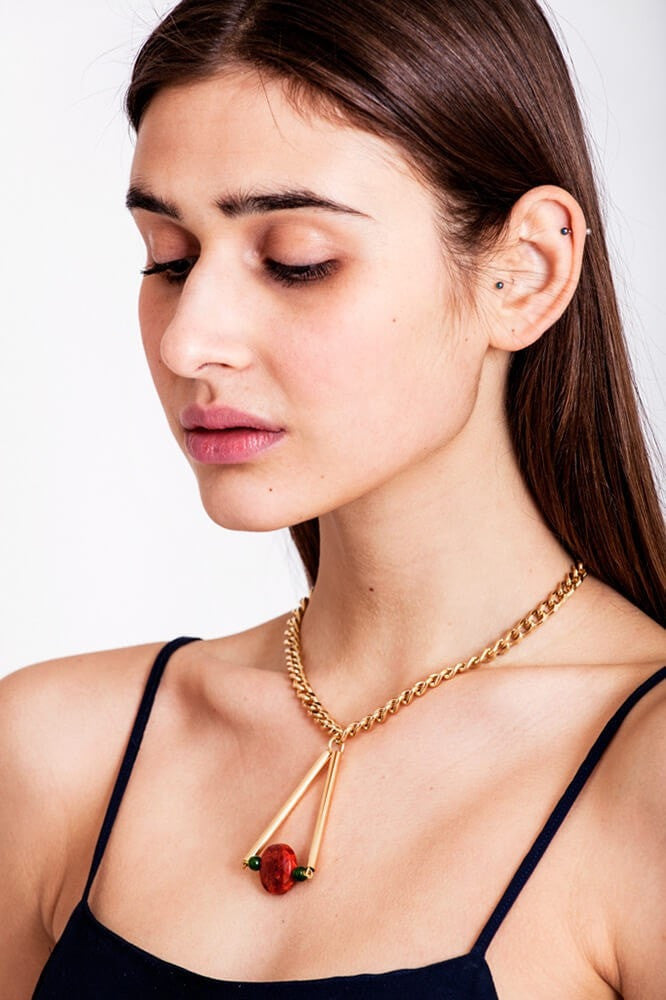 Red coral: Hand-cut, hand polished and galvanized brass, red coral, jade and galvanized metal components.