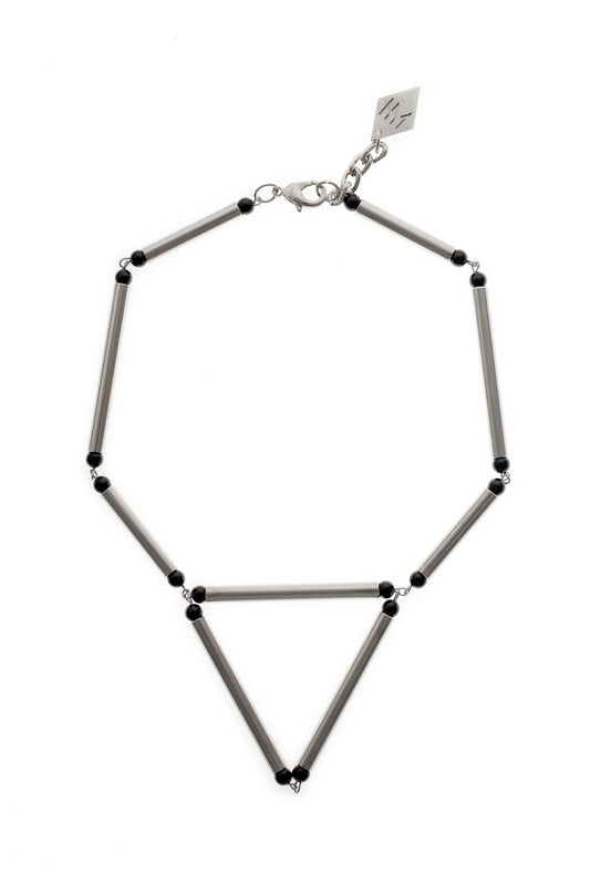 Aztec necklace is made of hand-cut and galvanized brass, onyx and galvanized metal components.