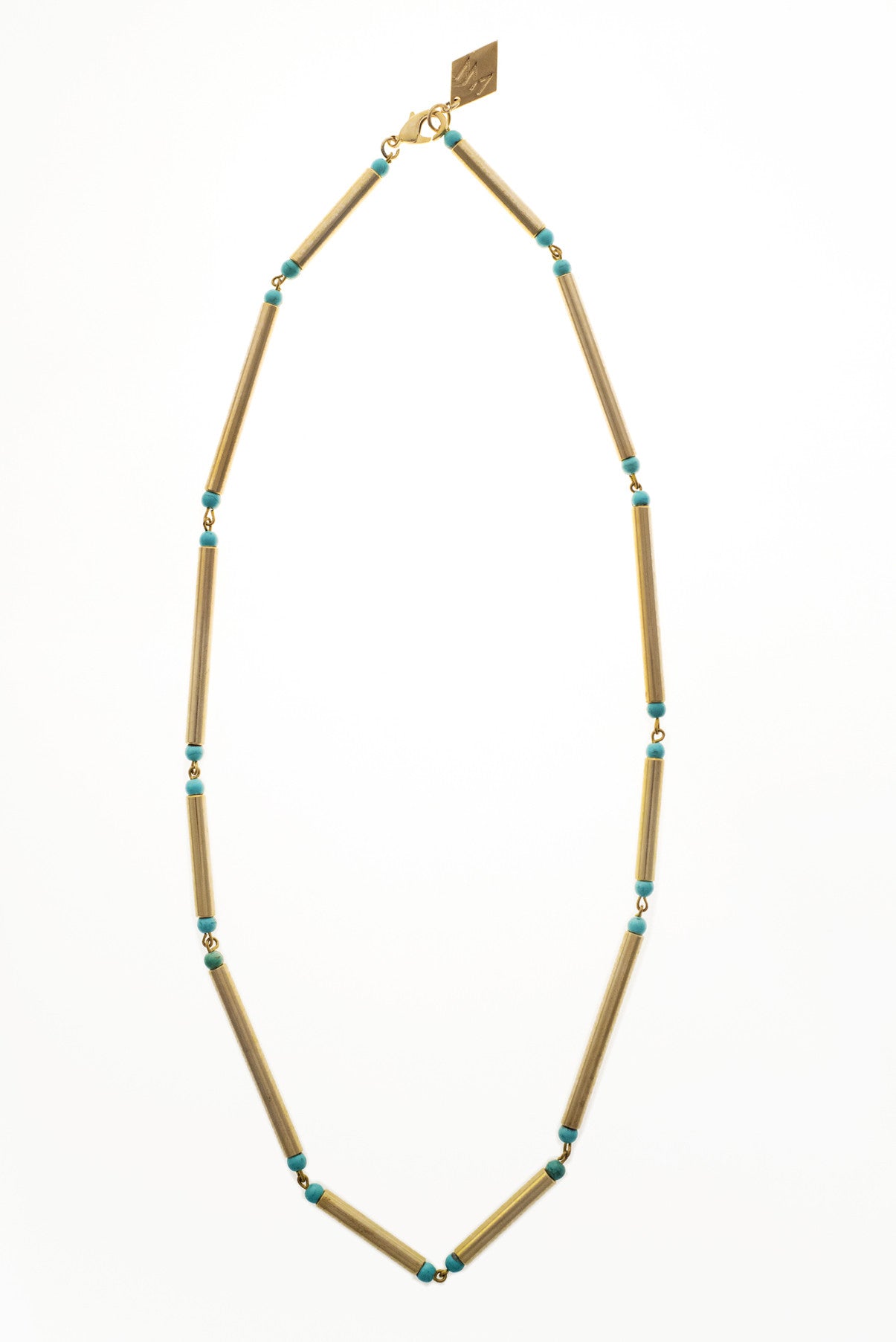 Hidden lines long necklace made of hand-cut, hand polished and galvanized brass featuring turquoise.
