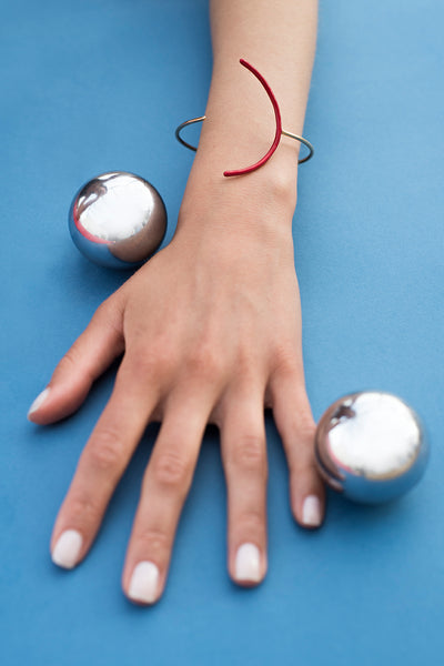 Playground cuff with a hint of red