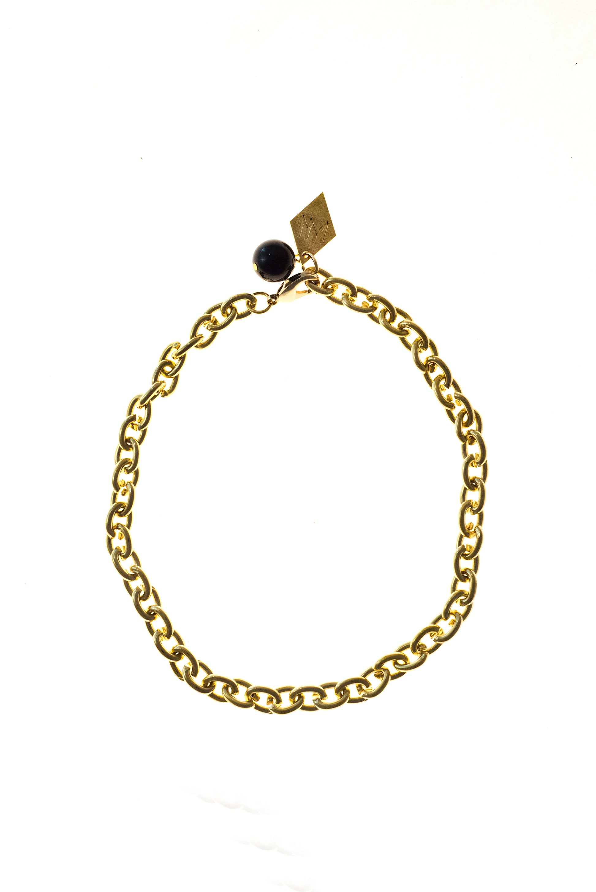 Anchor necklace is made of 24K gold-plated brass.