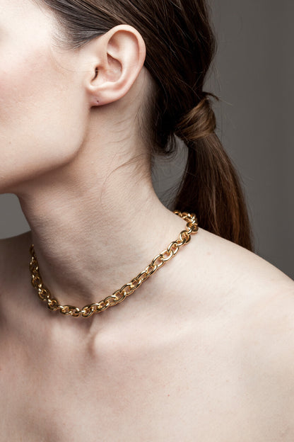 Anchor necklace is made of 24K gold-plated brass.