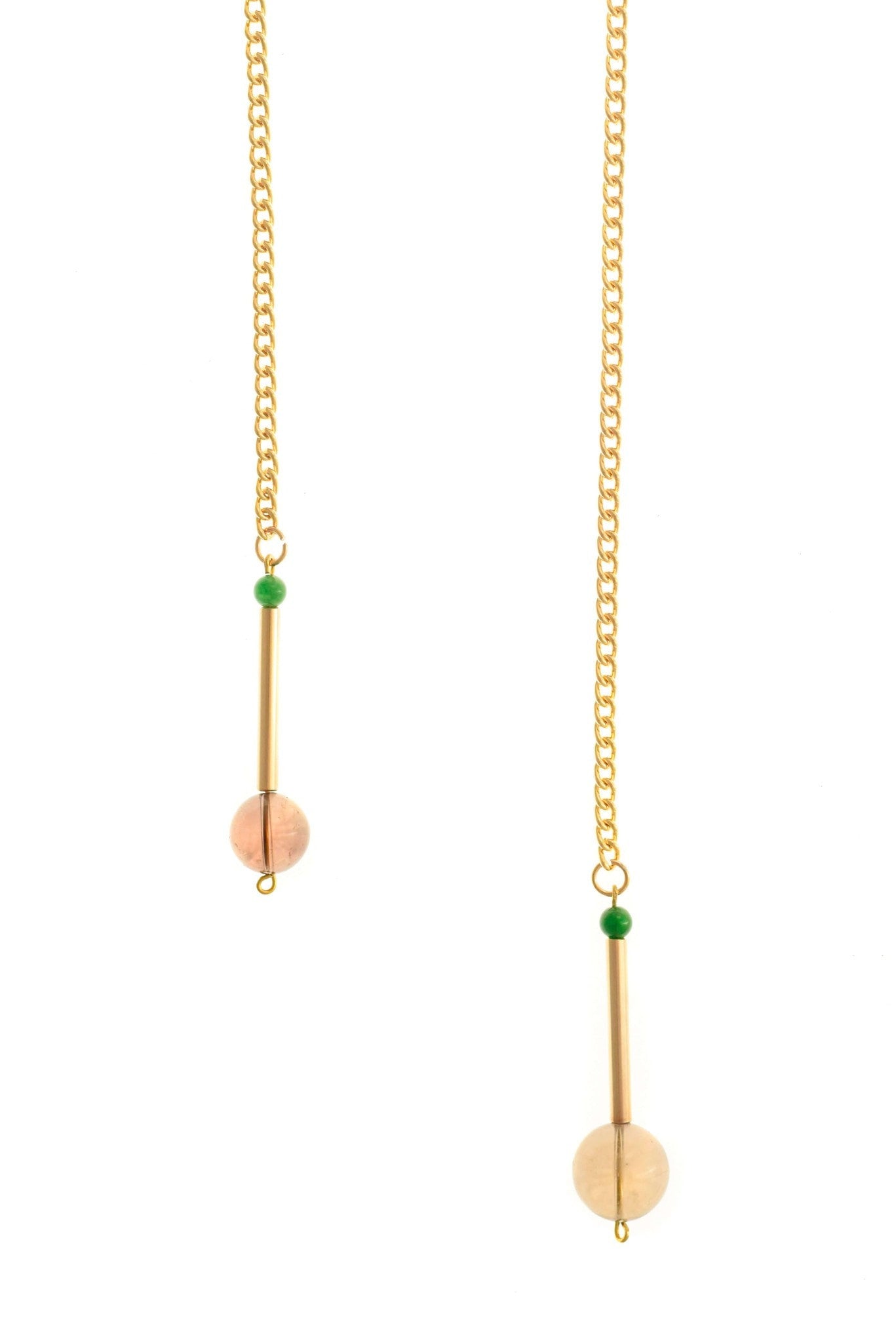 The Bellevue necklace made of hand-cut and galvanized brass, smokey quartz, jade and galvanized chain.