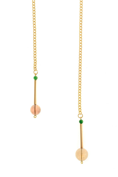 The Bellevue necklace made of hand-cut and galvanized brass, smokey quartz, jade and galvanized chain.