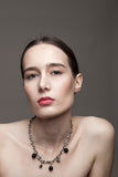 This necklace features galvanized chain called coffee beans chain and hand cut and galvanized brass and onyx.