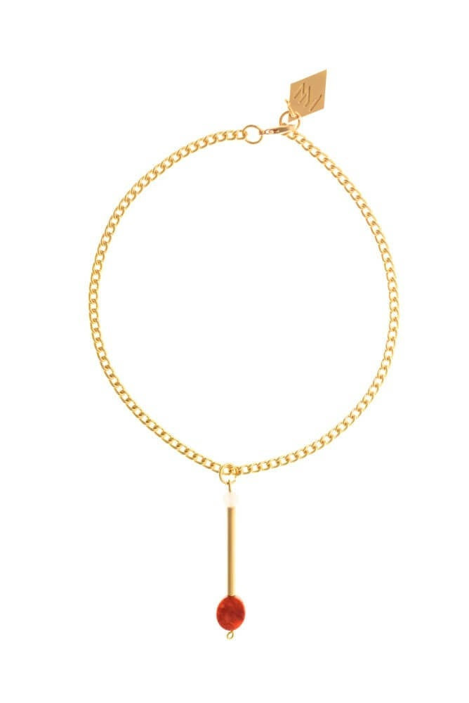 This cute as a button necklace is made of hand-cut and galvanized brass, red coral, rosequartz and galvanized metal componets.