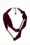 Embrassme necklace made of finest sheep napa, hand-cut, hand polished and galvanized brass and metal components. Purple-gold edition.