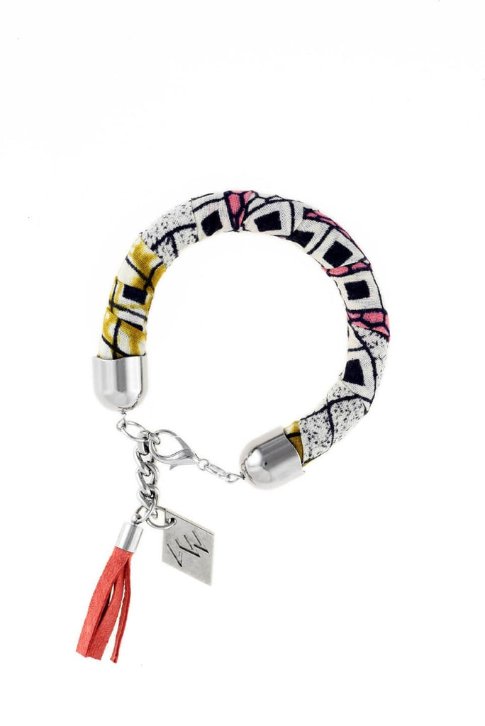 Bracelet made of african batik cotton with galvanized metal components and leather tassel. Silver edition.