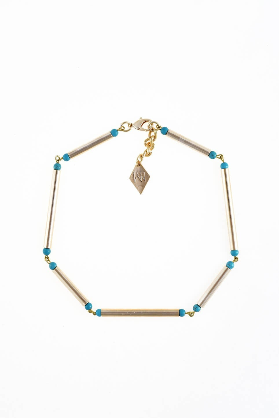 Gold edition: made of hand-cut and galvanized brass and turquoise.