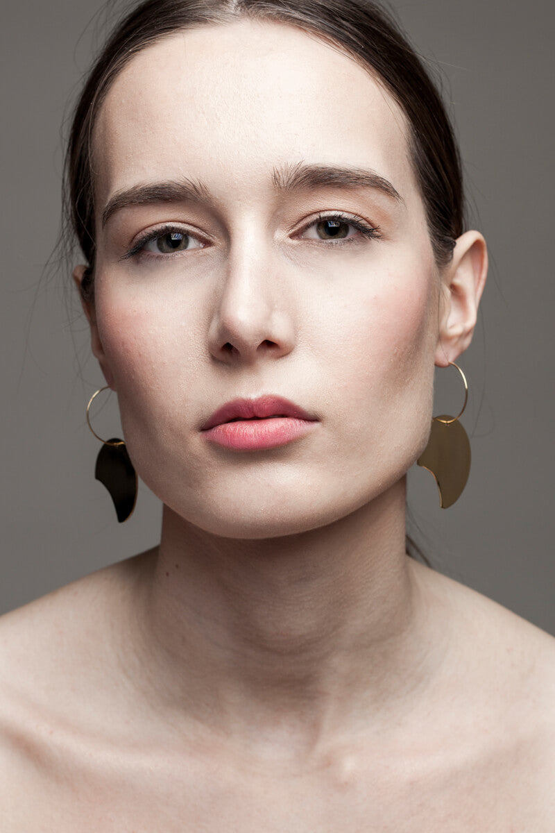Earrings made of 24K gold plated brass.