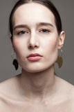 Earrings made of 24K gold plated brass.