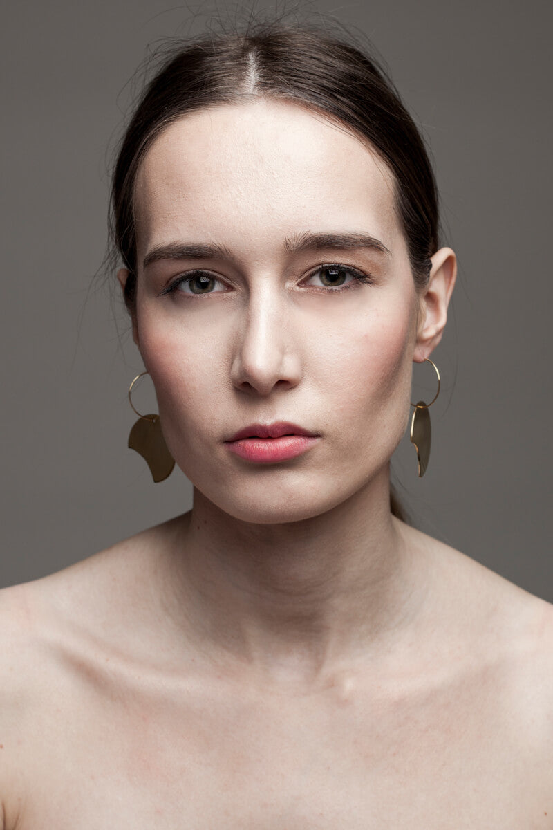 Earrings made of 24K gold plated brass.
