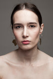 Earrings made of 24K gold plated brass.