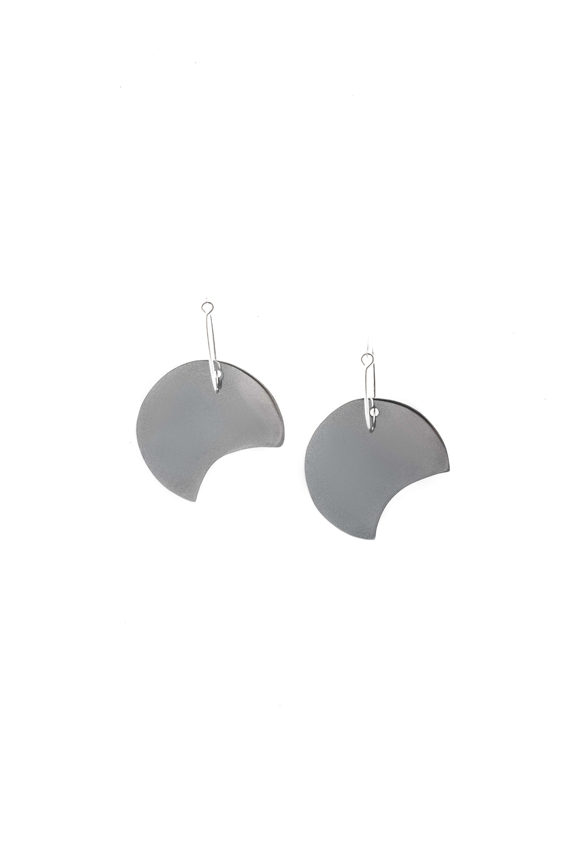 Earrings made of brass galvanized in silver.