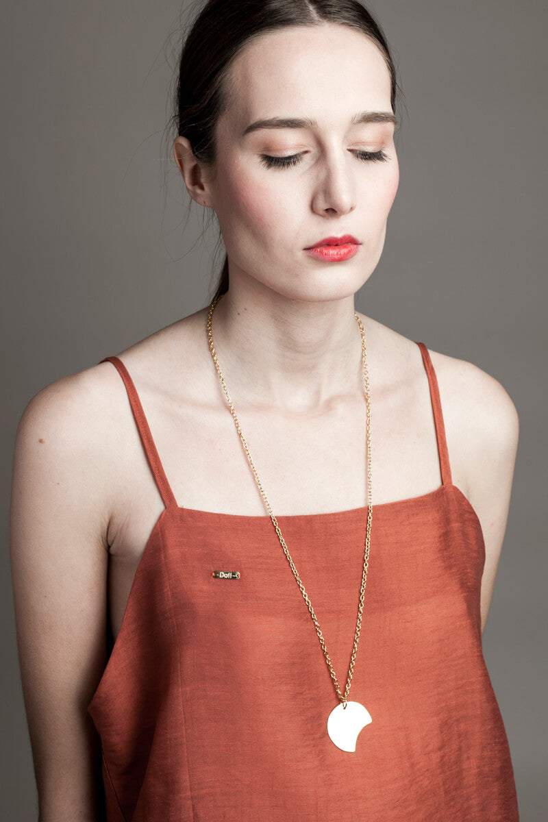 Long necklace made of hand cut and 24K gold-plated brass and chain.
