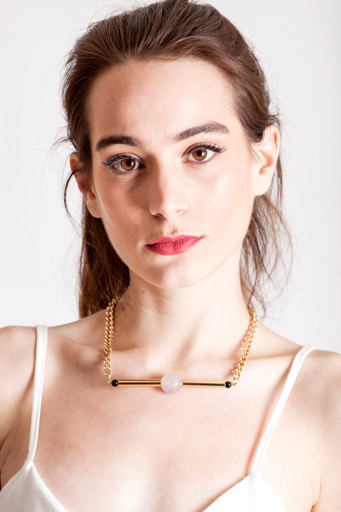 Line necklace made of hand-cut and galvanized brass, amethyst, onyx and galvanized metal components.