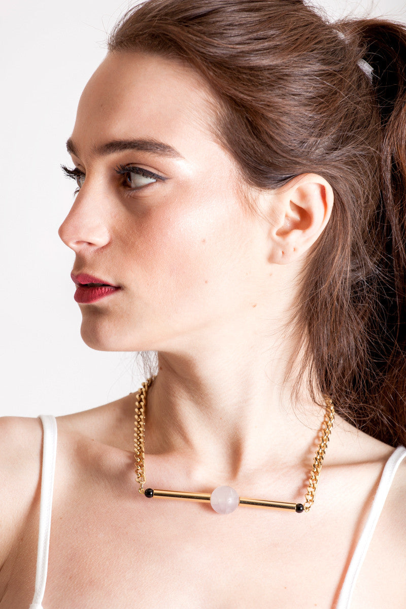 Line necklace made of hand-cut and galvanized brass, amethyst, onyx and galvanized metal components.
