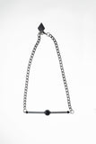Line necklace made of hand-cut and galvanized brass, onyx and galvanized metal components.