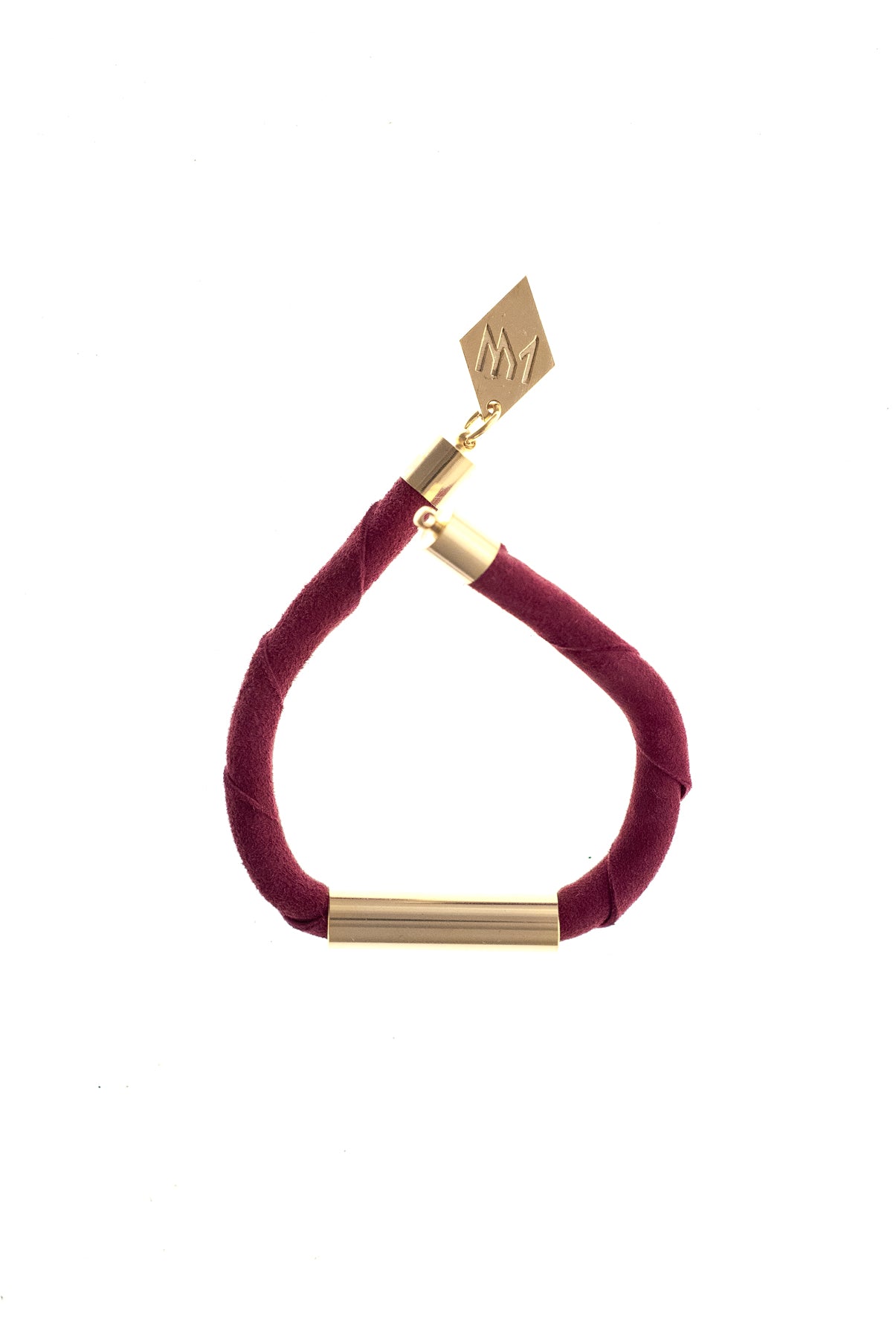 Line cuff made of purple suede and hand-cut, hand polished and galvanized brass. Gold edition.