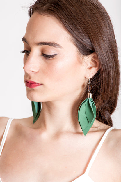 Leaf earrings made of hand-cut green leather, galvanized brass, smokey quartz and sterling silver.