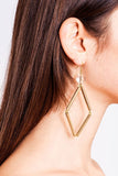 Norma earrings made of quartz, brass and gold plated sterling silver