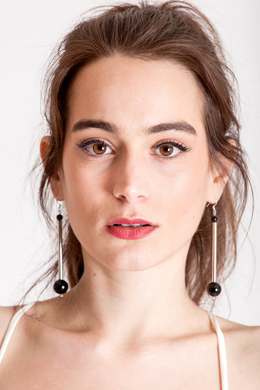 Bellevue earrings made of hand-cut, hand polished and galvanized brass, onyx and sterling silver.