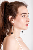 Bellevue earrings made of hand-cut, hand polished and galvanized brass, onyx and sterling silver.