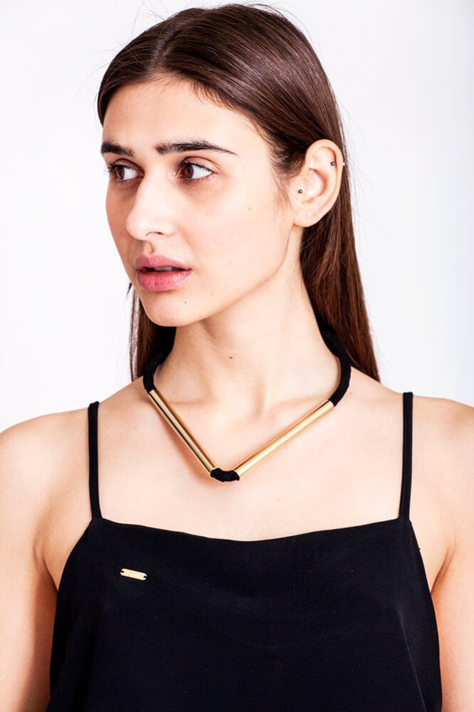 Triangle necklace made of the finest leather, hand-cut, hand polished and galvanized brass. Gold edition.
