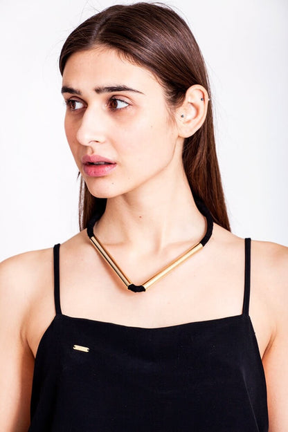 Triangle necklace made of the finest leather, hand-cut, hand polished and galvanized brass. Gold edition.