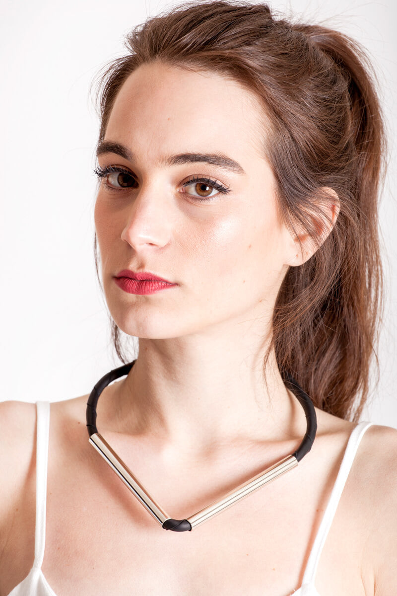 Triangle necklace made of the finest leather, hand-cut, hand polished and galvanized brass. Silver edition.