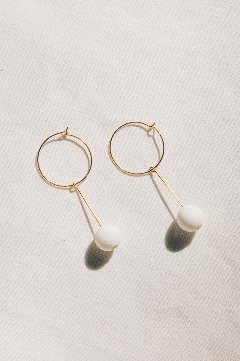 White Coral Drop Earrings in Gold by sustainable designer brand Little Wonder