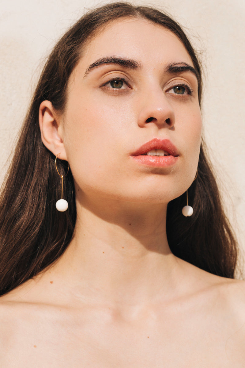 White Coral Drop Earrings in Gold by sustainable designer brand Little Wonder