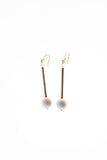 Earrings made of hand-cut, hand-polished and 24K gold-plated brass, white coral, rose quartz and gold plated sterling silver.