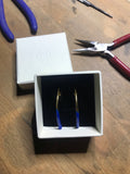 Bow earrings with a hint of blue