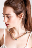 Triangle necklace made of finest gray leather and hand-cut, hand-polished and galvanized brass.